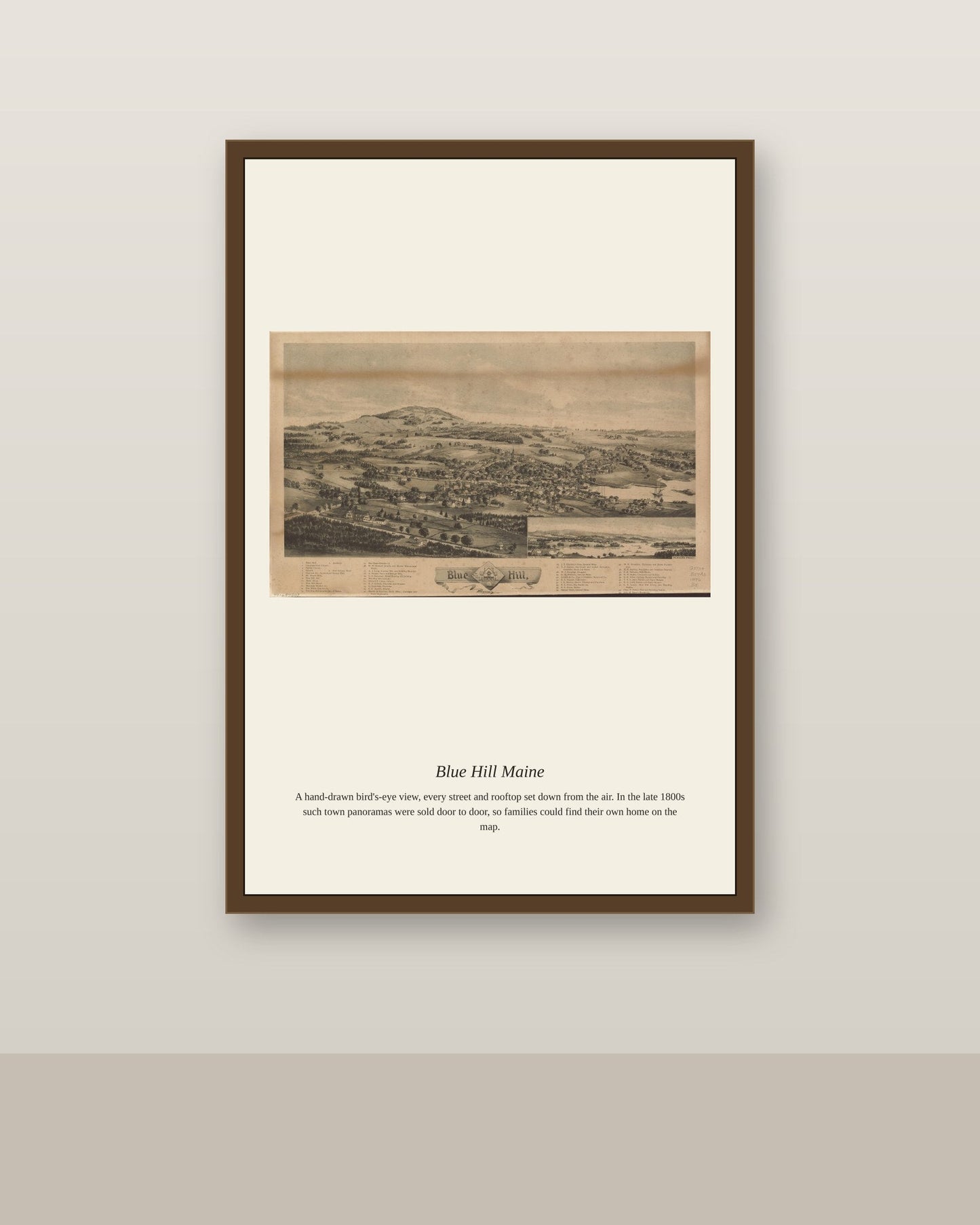 Blue Hill Maine antique map print shown framed on a wall in a styled room