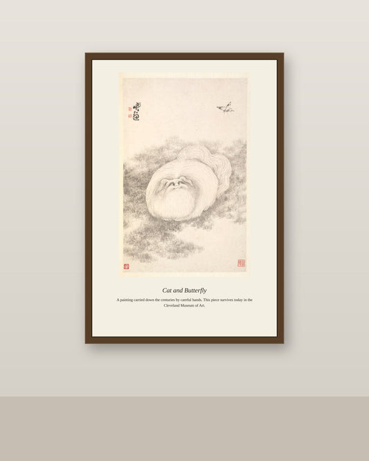 Cat and Butterfly antique natural history print shown framed on a wall in a styled room