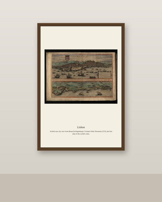 Lisbon antique city map print shown framed on a wall in a styled room