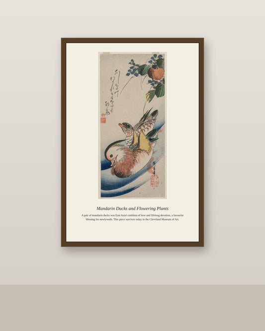 Mandarin Ducks and Flowering Plants antique botanical print shown framed on a wall in a styled room