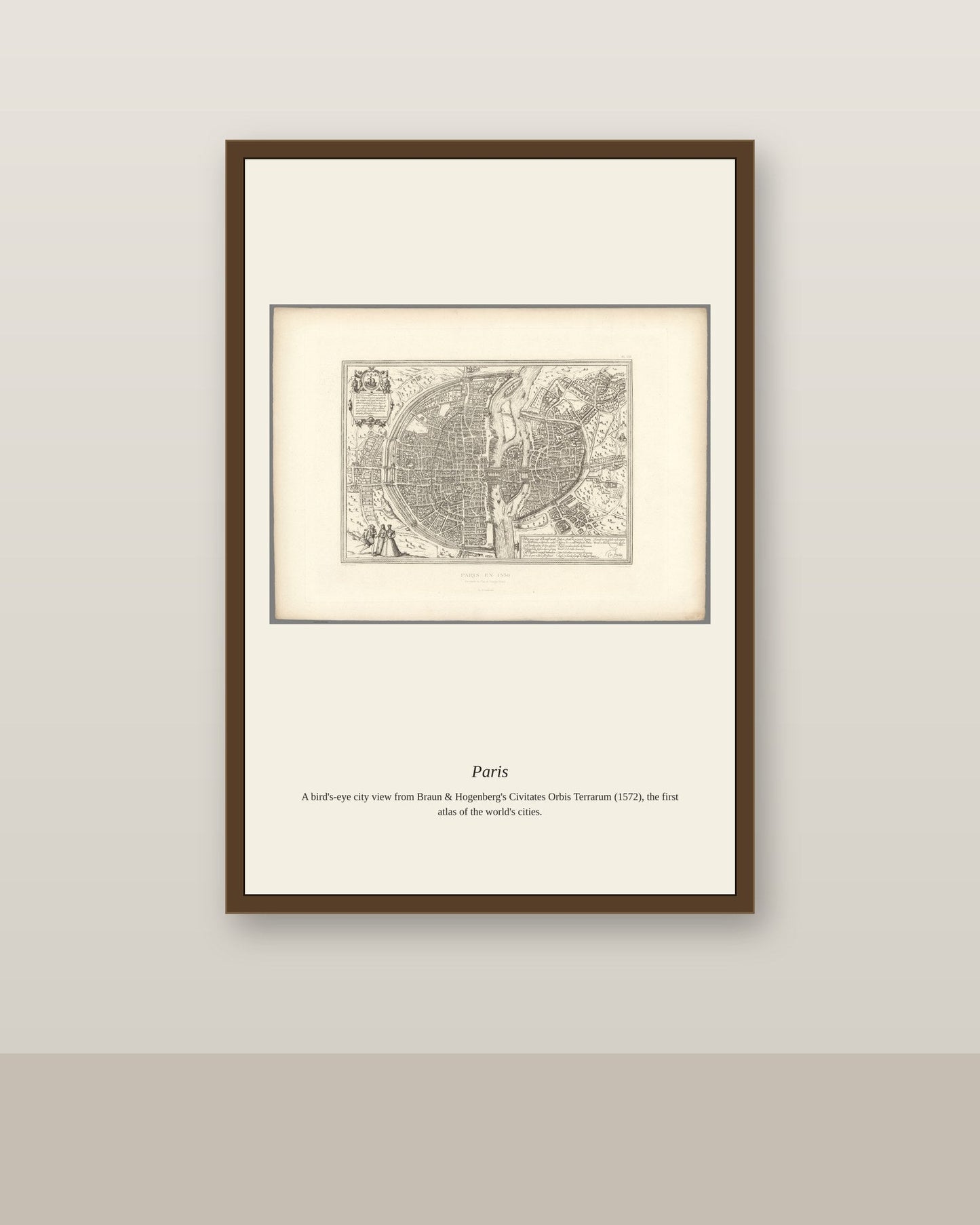 Paris antique art print shown framed on a wall in a styled room