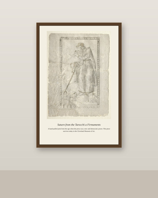 Saturn, Mantegna Tarocchi antique celestial print shown framed on a wall in a styled room