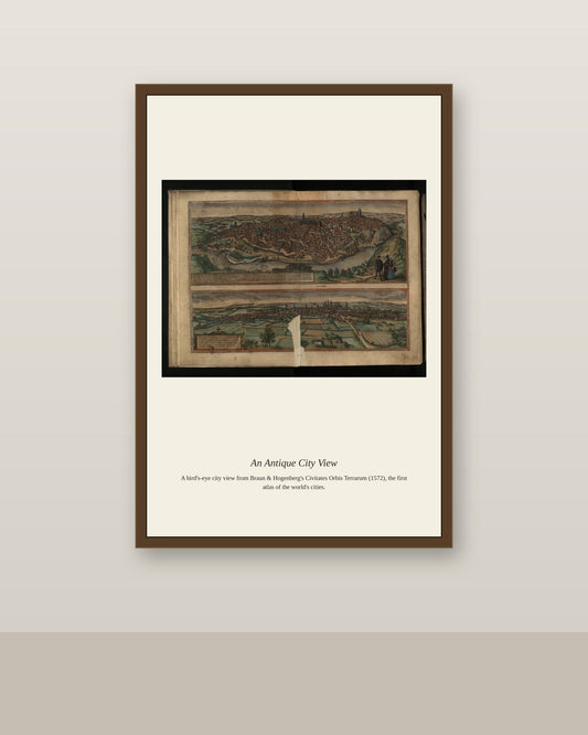 Toledo (2) antique city map print shown framed on a wall in a styled room