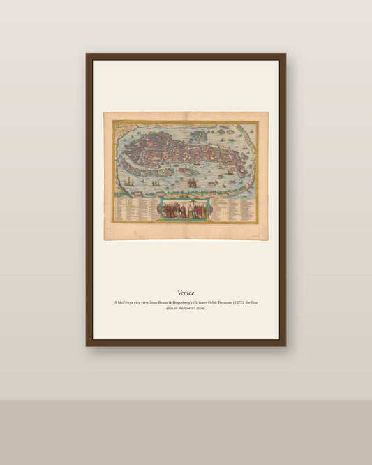 Venice (2) antique city map print shown framed on a wall in a styled room