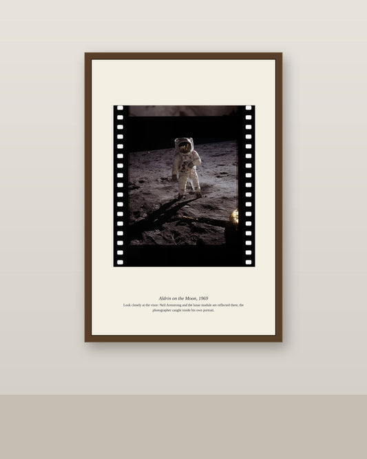Aldrin on the Moon filmstrip-framed print displayed in a warm neutral gallery wall mockup