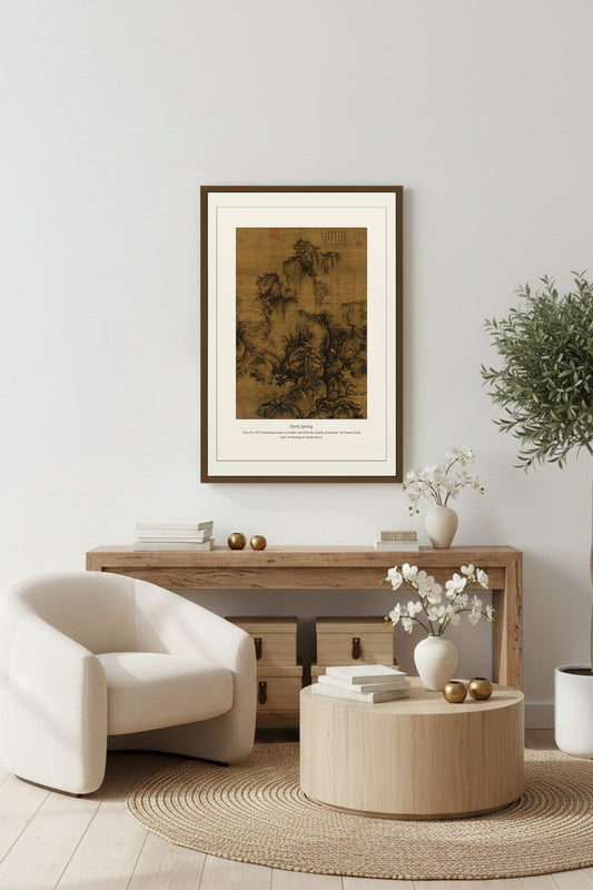 Guo Xi mountain landscape print framed above a console with armchair