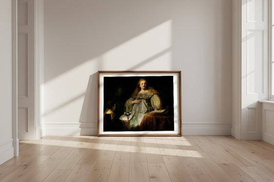 Judith at the Banquet of Holofernes — Rembrandt van Rijn Fine Art Poster shown framed and leaning against a wall in a sunlit room