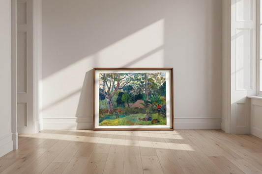 The Big Tree — Paul Gauguin Fine Art Poster shown framed and leaning against a wall in a sunlit room