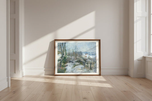 Rabbit Warren at Pontoise, Snow — Camille Pissarro Fine Art Poster shown framed and leaning against a wall in a sunlit room