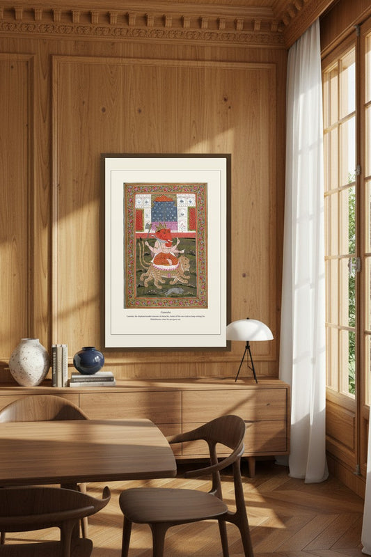 Ganesha print framed in a wood-paneled dining room beside a window