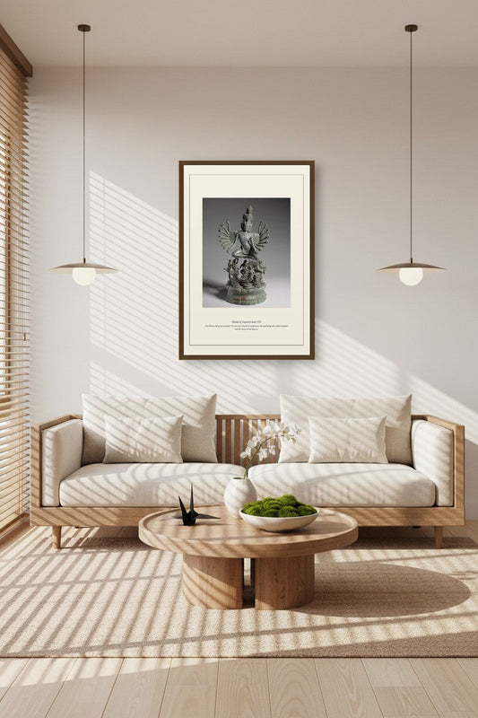 Head of Jayavarman VII framed above a sofa in a sunlit living room