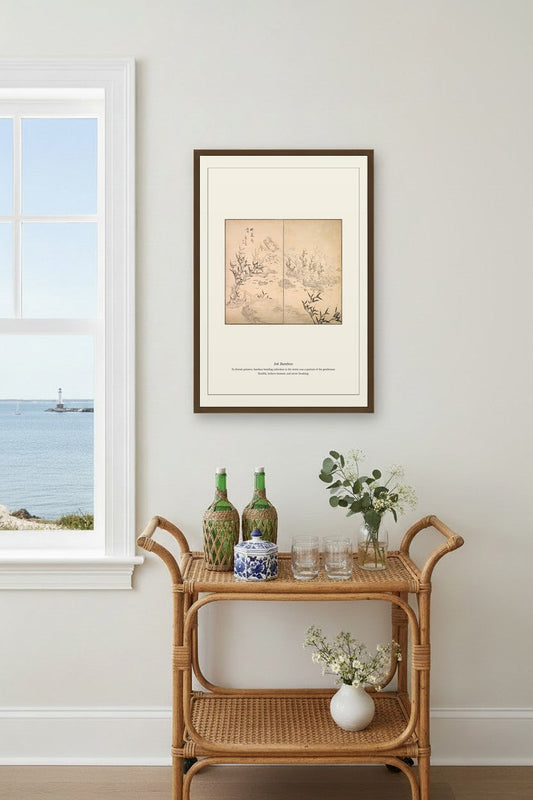 Ink Bamboo print framed above a rattan bar cart beside a coastal window