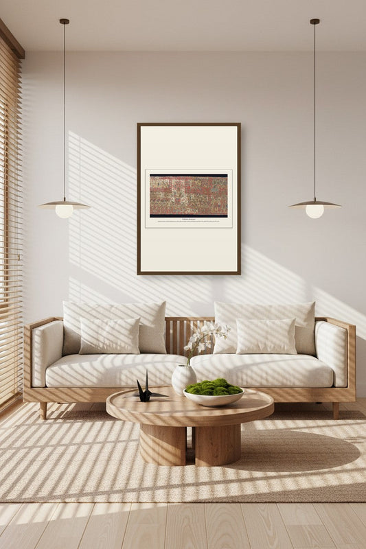 A Balinese Ramayana print framed above a linen sofa beneath pendant lights in a sunlit living room