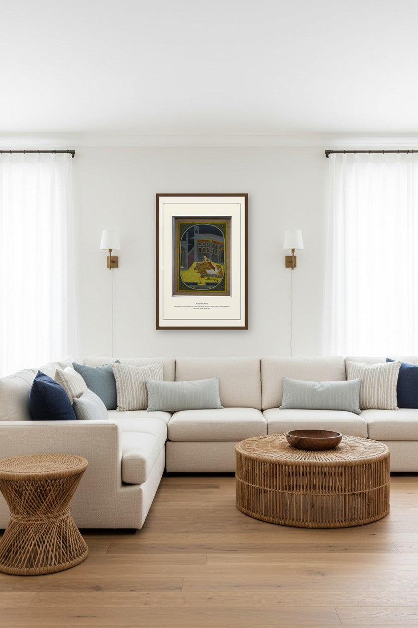 A Nayika Waits miniature framed above a coastal-style sectional sofa with a rattan coffee table