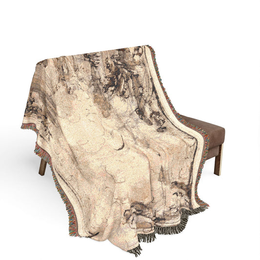 Sacrificial Offering in a Temple throw blanket over bench, cream sepia-brown ink design, colorful fringe cascading down sides