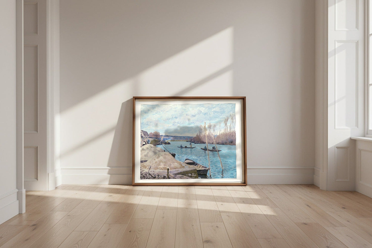 The Seine at Port-Marly, Piles of Sand — Alfred Sisley Fine Art Poster shown framed and leaning against a wall in a sunlit room
