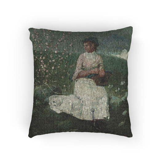 Square throw pillow featuring a textured, painterly print of a seated woman in a white dress in a dark green garden setting, shown against a plain white background.