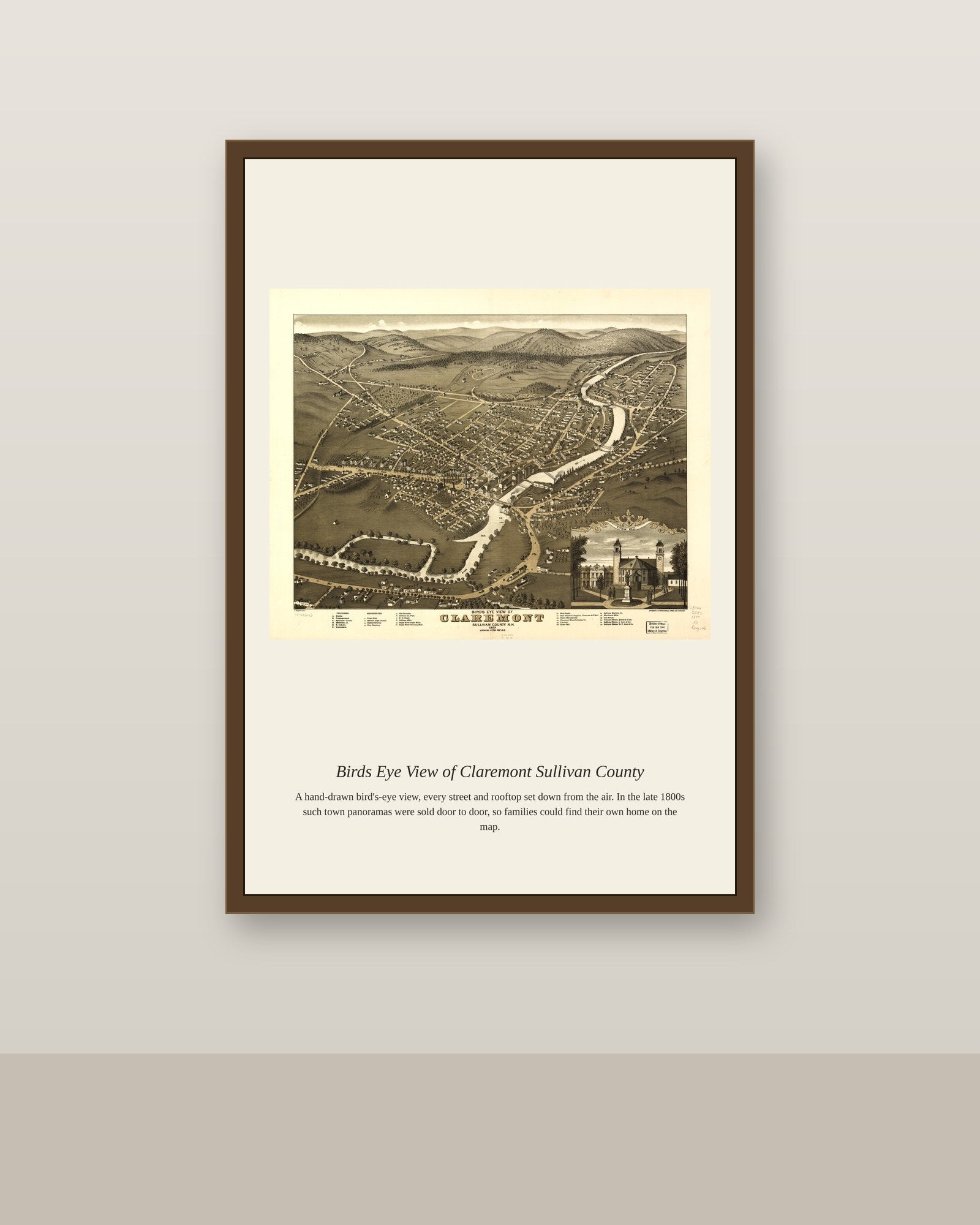 Birds Eye View of Claremont Sullivan County antique map print shown framed on a wall in a styled room