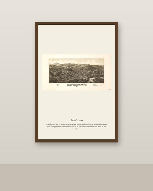Brattleboro antique map print shown framed on a wall in a styled room