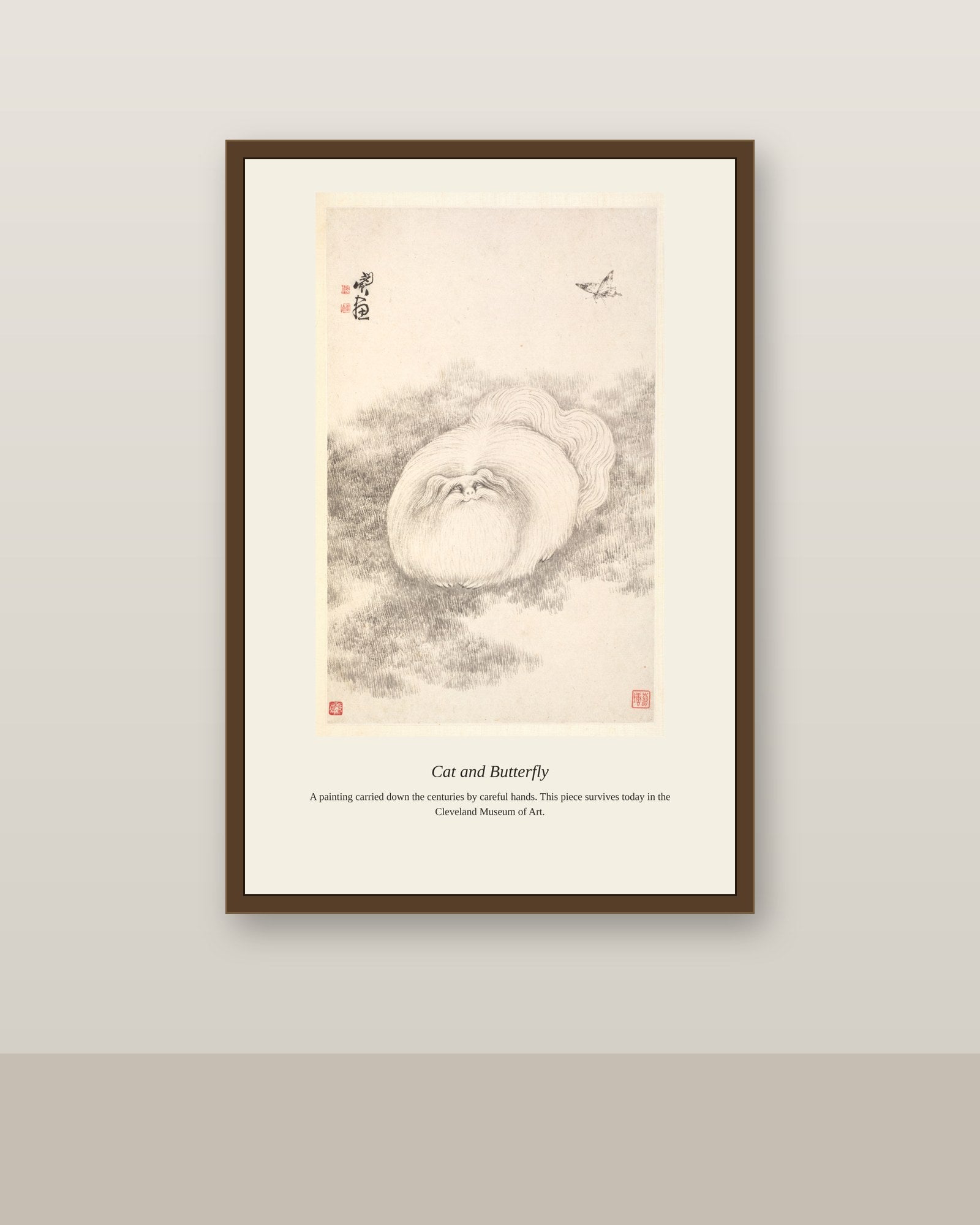 Cat and Butterfly antique natural history print shown framed on a wall in a styled room