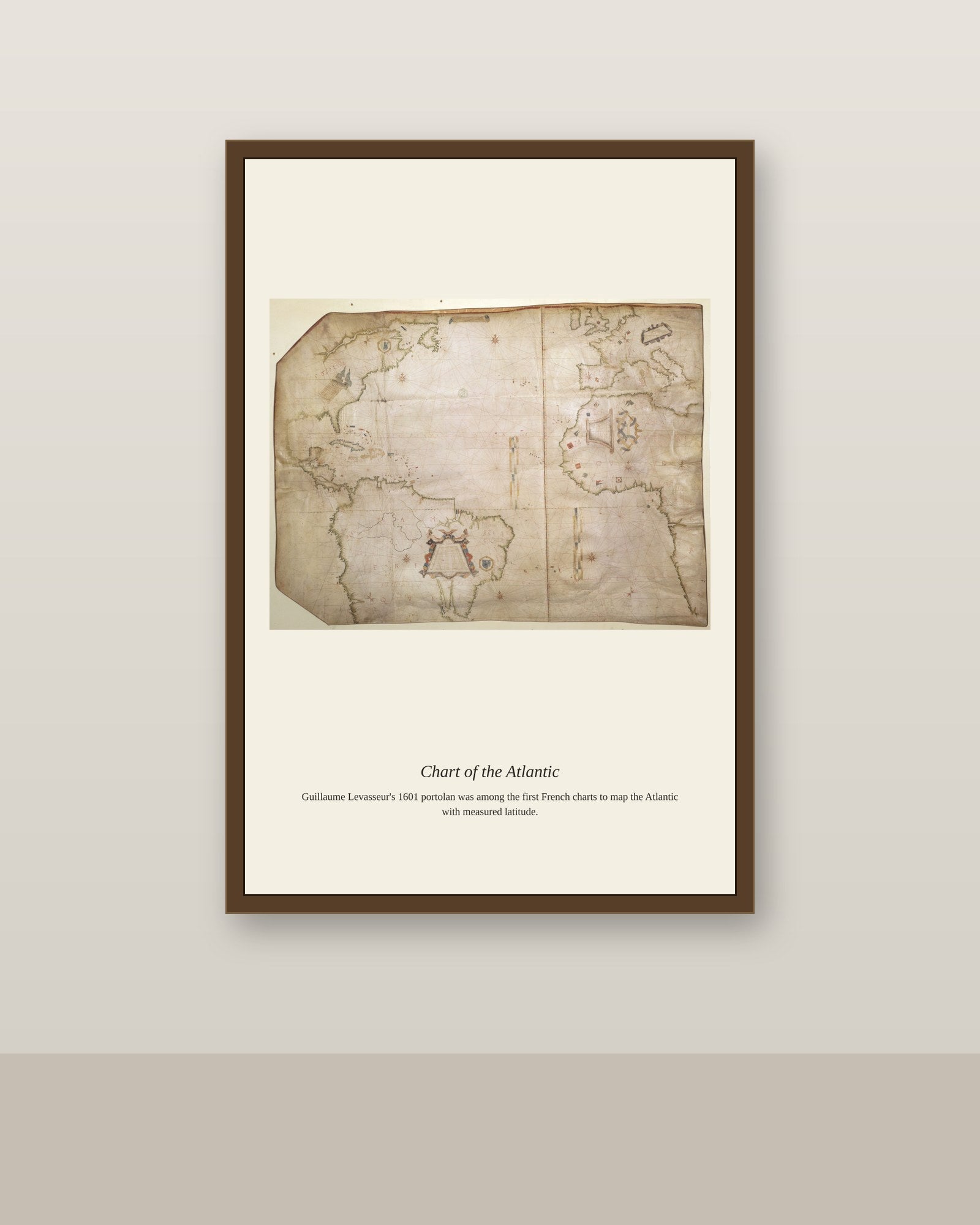 Chart of the Atlantic Ocean antique nautical chart print shown framed on a wall in a styled room