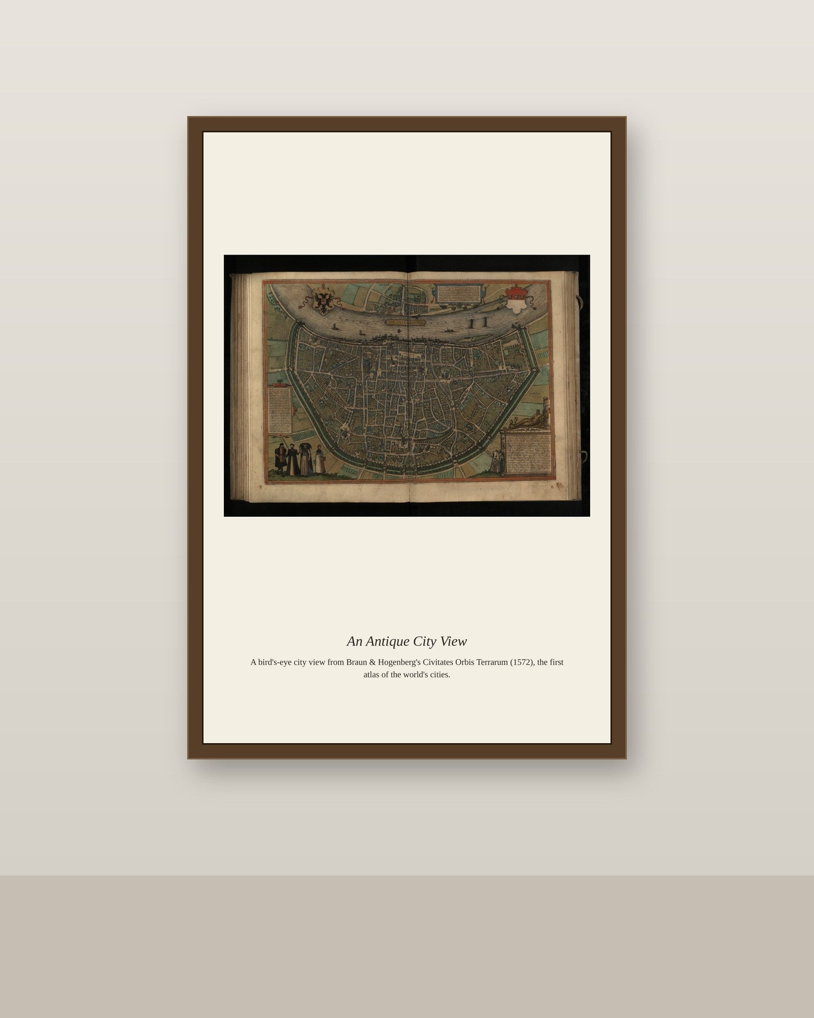 Cologne antique city map print shown framed on a wall in a styled room