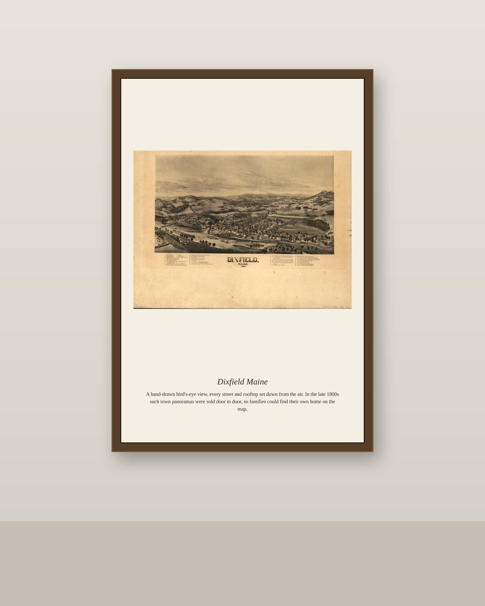 Dixfield Maine antique map print shown framed on a wall in a styled room