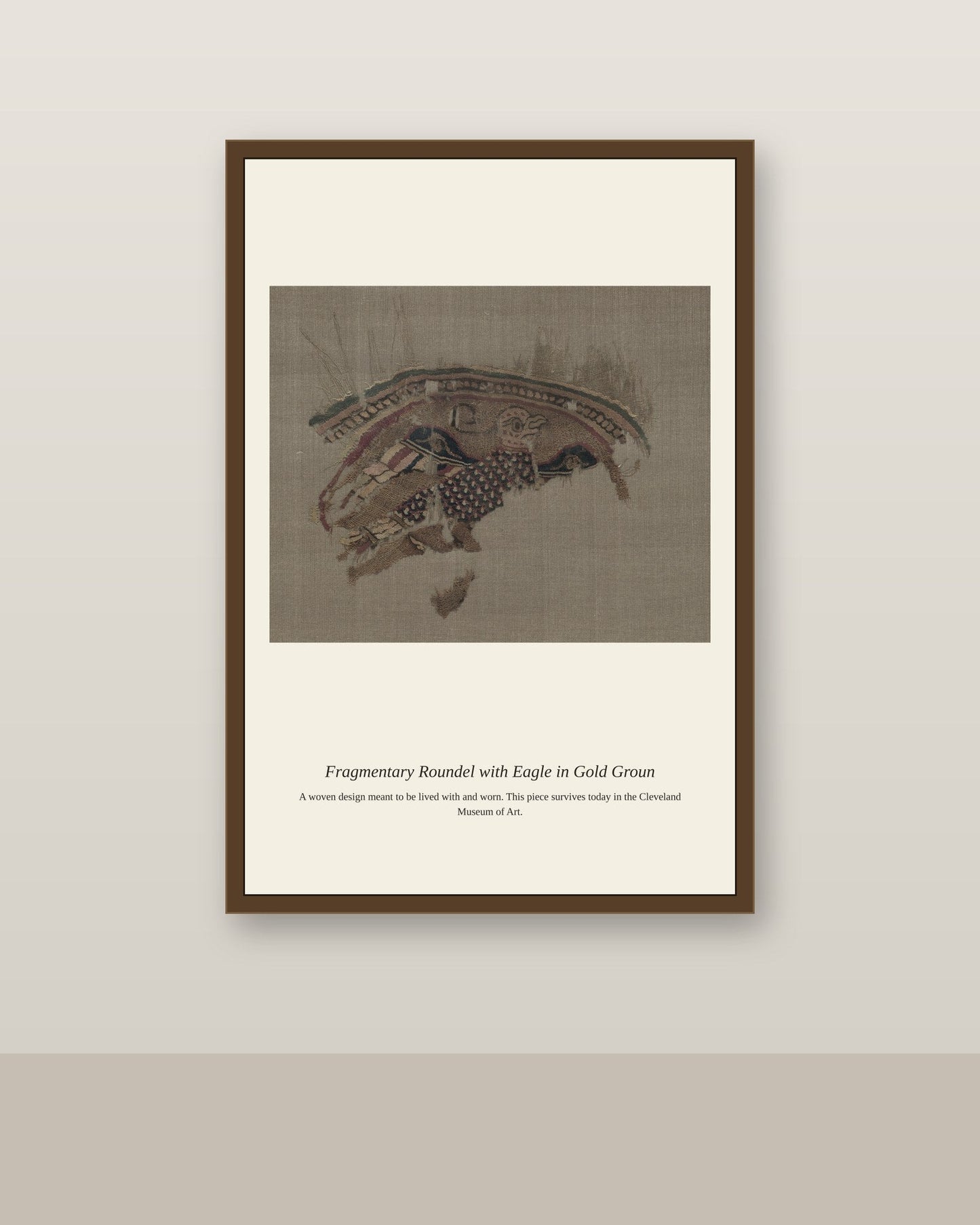 Fragmentary Roundel with Eagle in Gold Groun antique textile print shown framed on a wall in a styled room