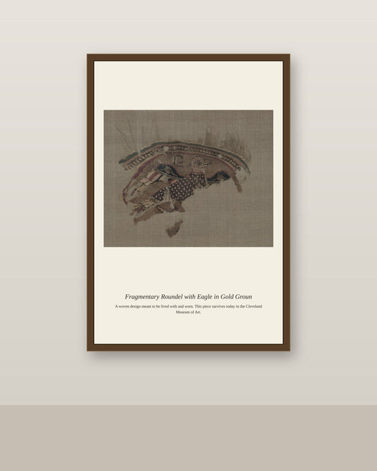 Fragmentary Roundel with Eagle in Gold Groun antique textile print shown framed on a wall in a styled room