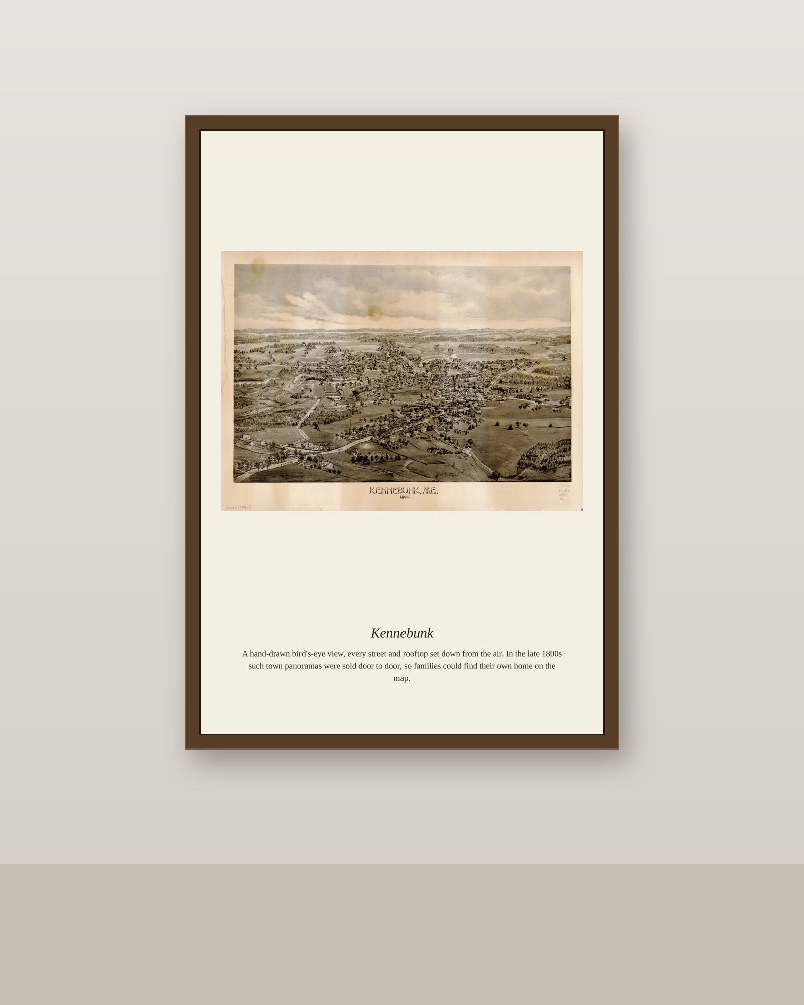 Kennebunk antique map print shown framed on a wall in a styled room