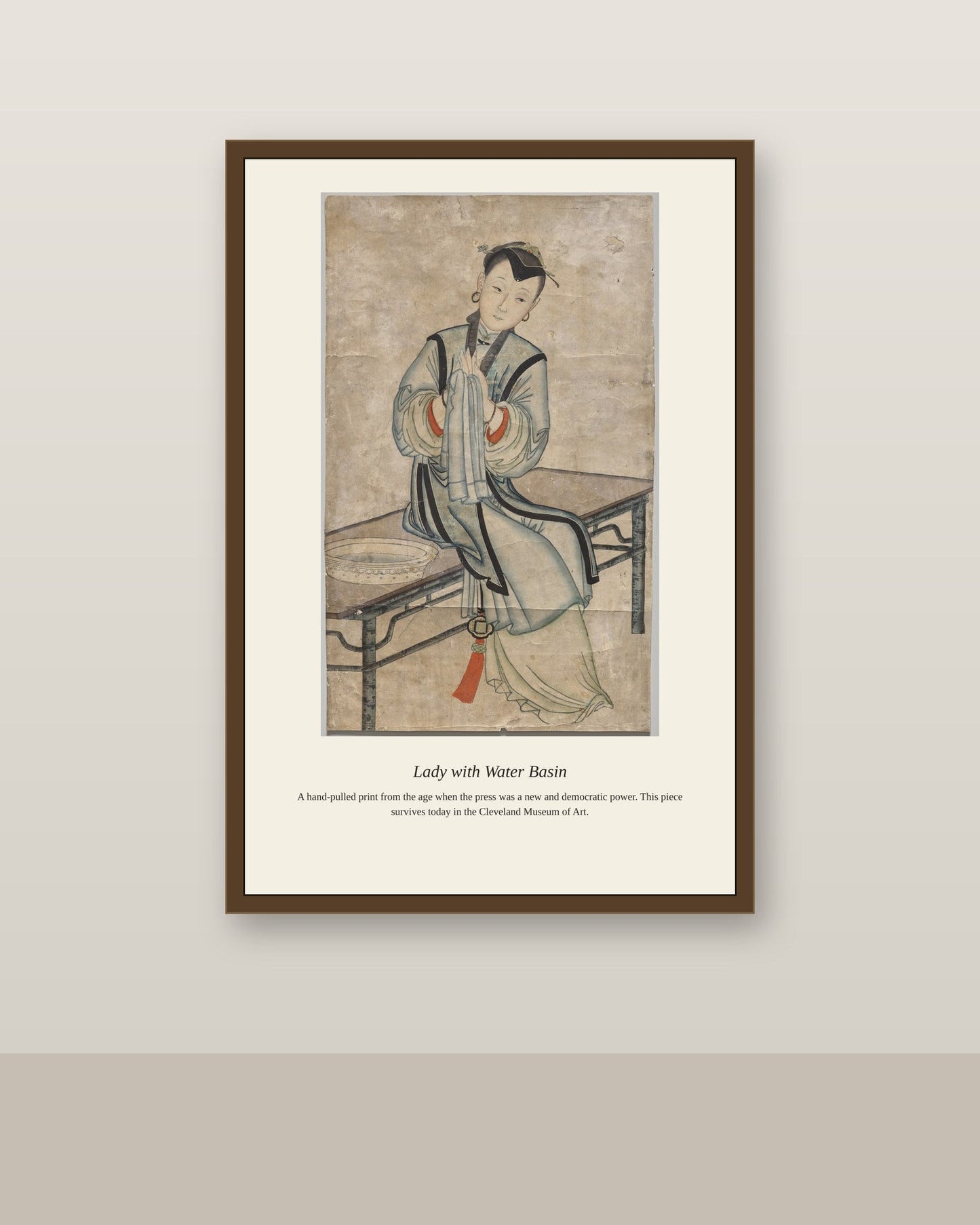 Lady with Water Basin antique portrait print shown framed on a wall in a styled room