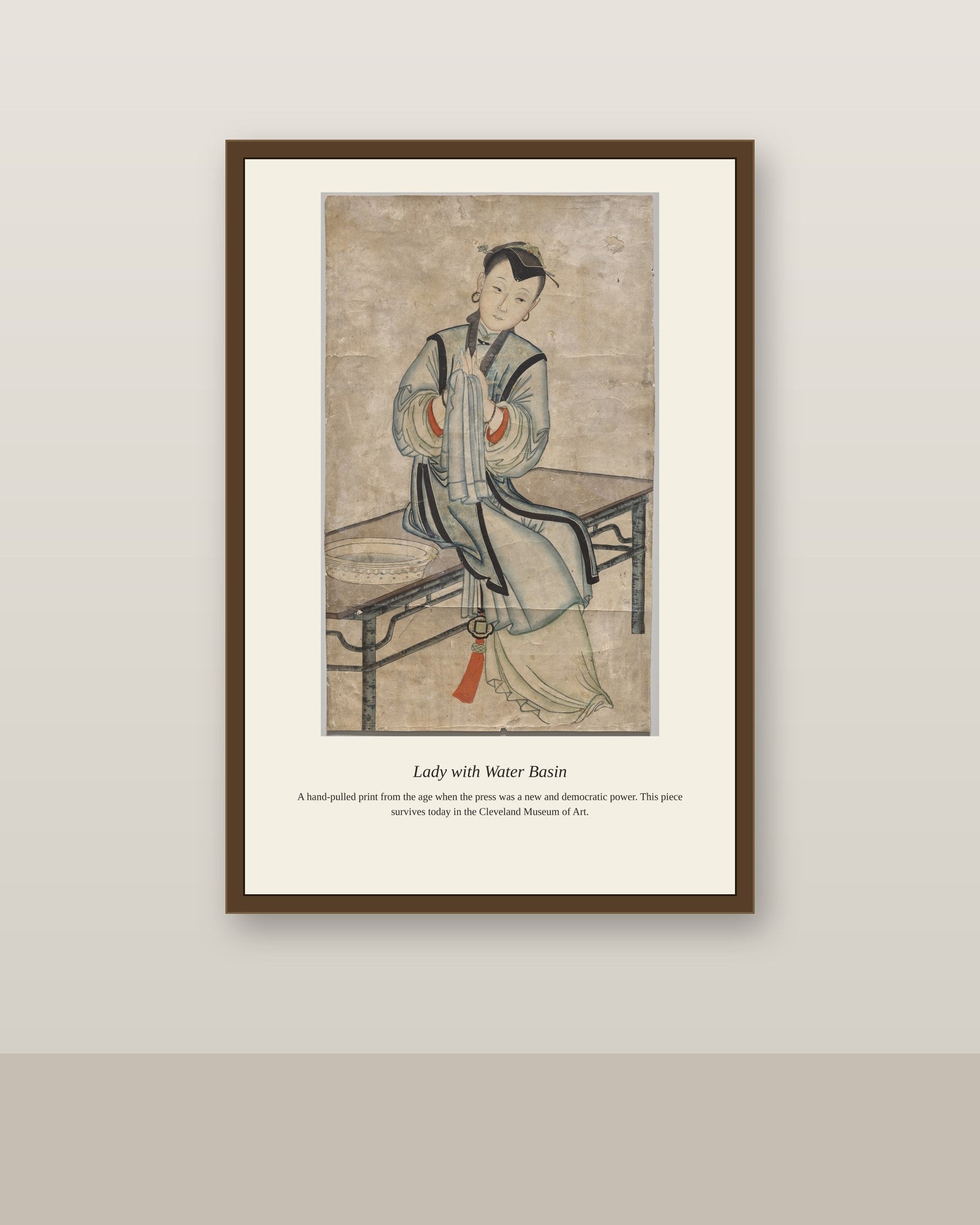 Lady with Water Basin antique portrait print shown framed on a wall in a styled room