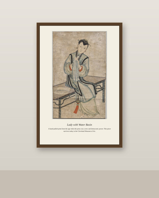 Lady with Water Basin antique portrait print shown framed on a wall in a styled room