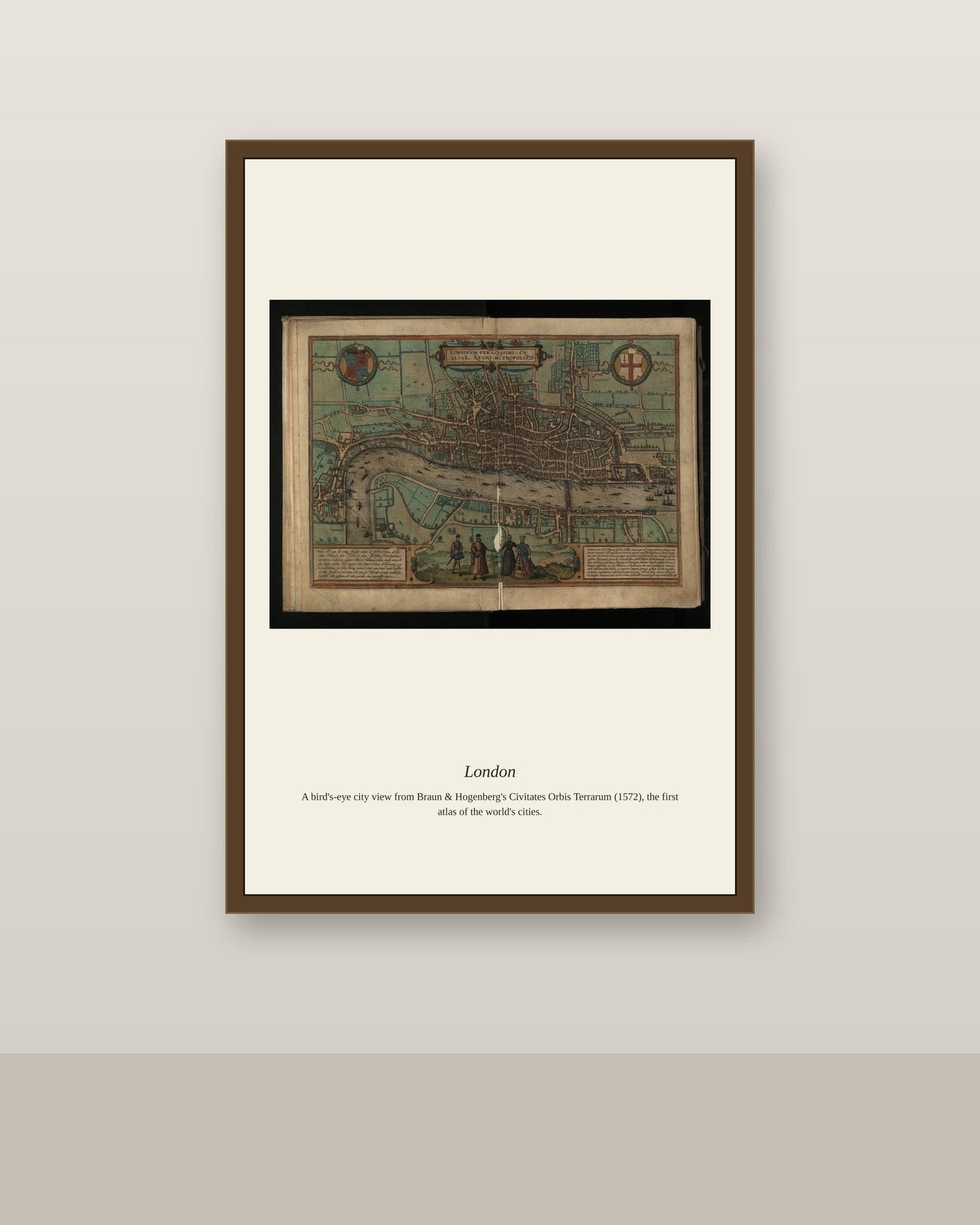 London antique city map print shown framed on a wall in a styled room