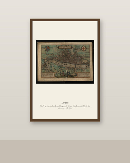 London antique city map print shown framed on a wall in a styled room