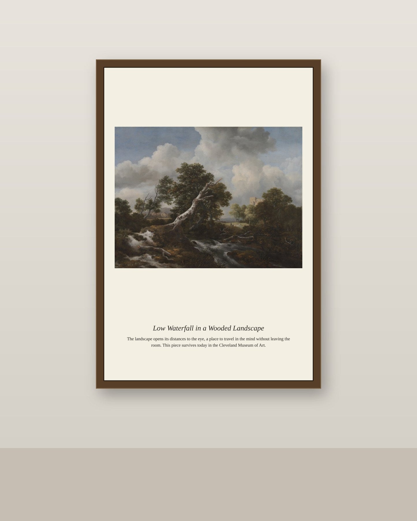 Low Waterfall in a Wooded Landscape antique landscape print shown framed on a wall in a styled room