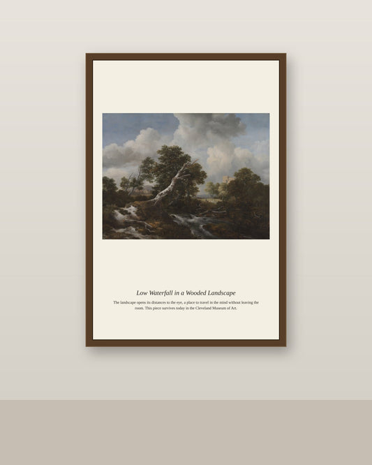Low Waterfall in a Wooded Landscape antique landscape print shown framed on a wall in a styled room