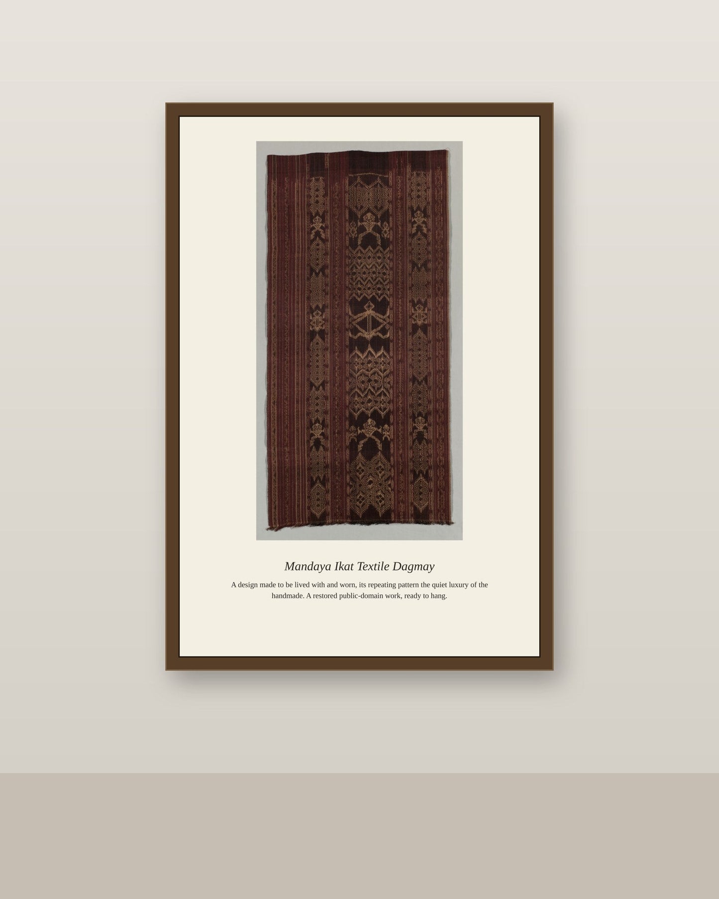 Mandaya Ikat Textile Dagmay antique textile print shown framed on a wall in a styled room