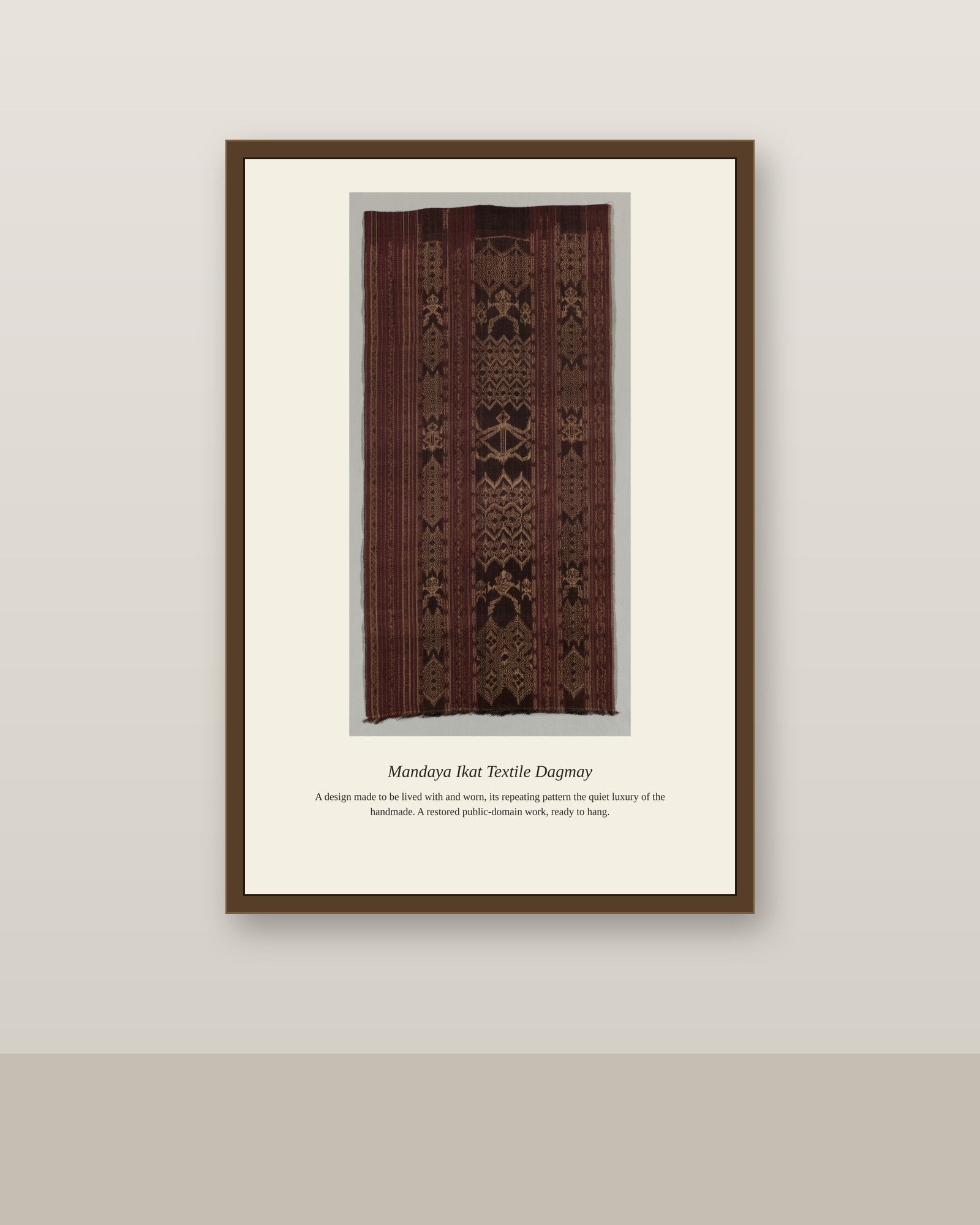 Mandaya Ikat Textile Dagmay antique textile print shown framed on a wall in a styled room