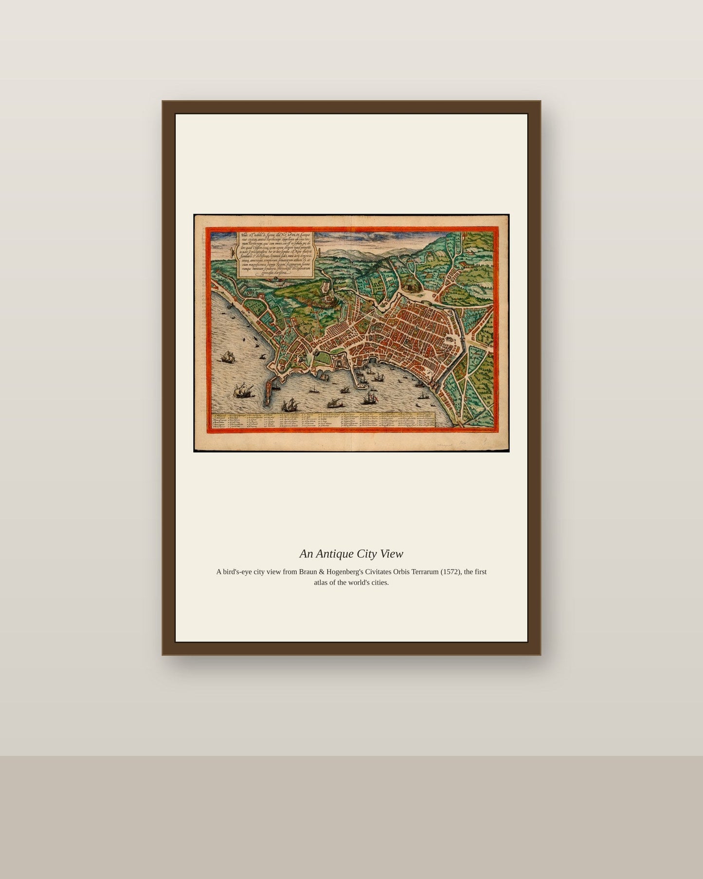 Naples antique city map print shown framed on a wall in a styled room