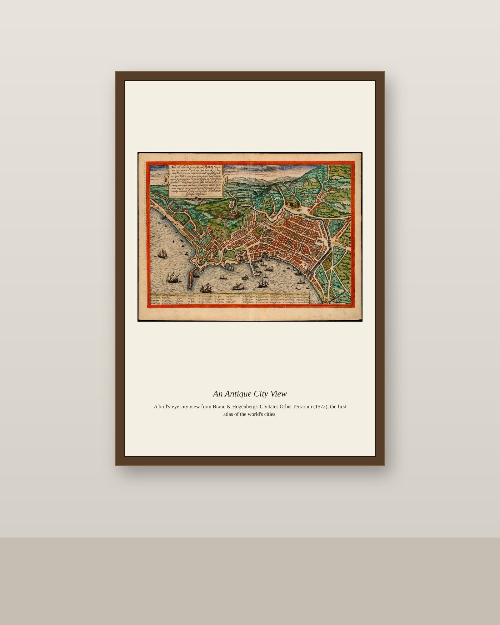 Naples antique city map print shown framed on a wall in a styled room