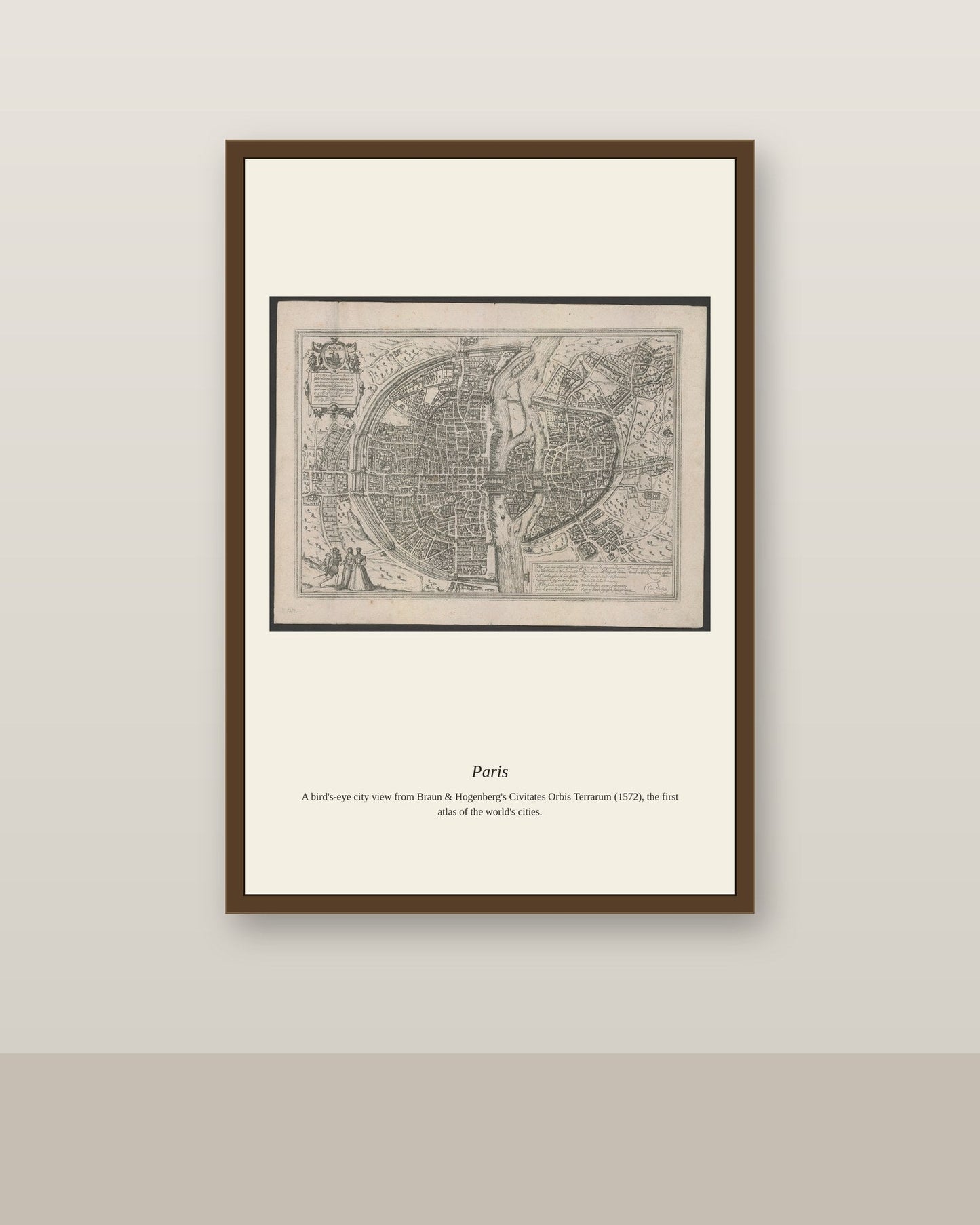 Paris (2) antique city map print shown framed on a wall in a styled room