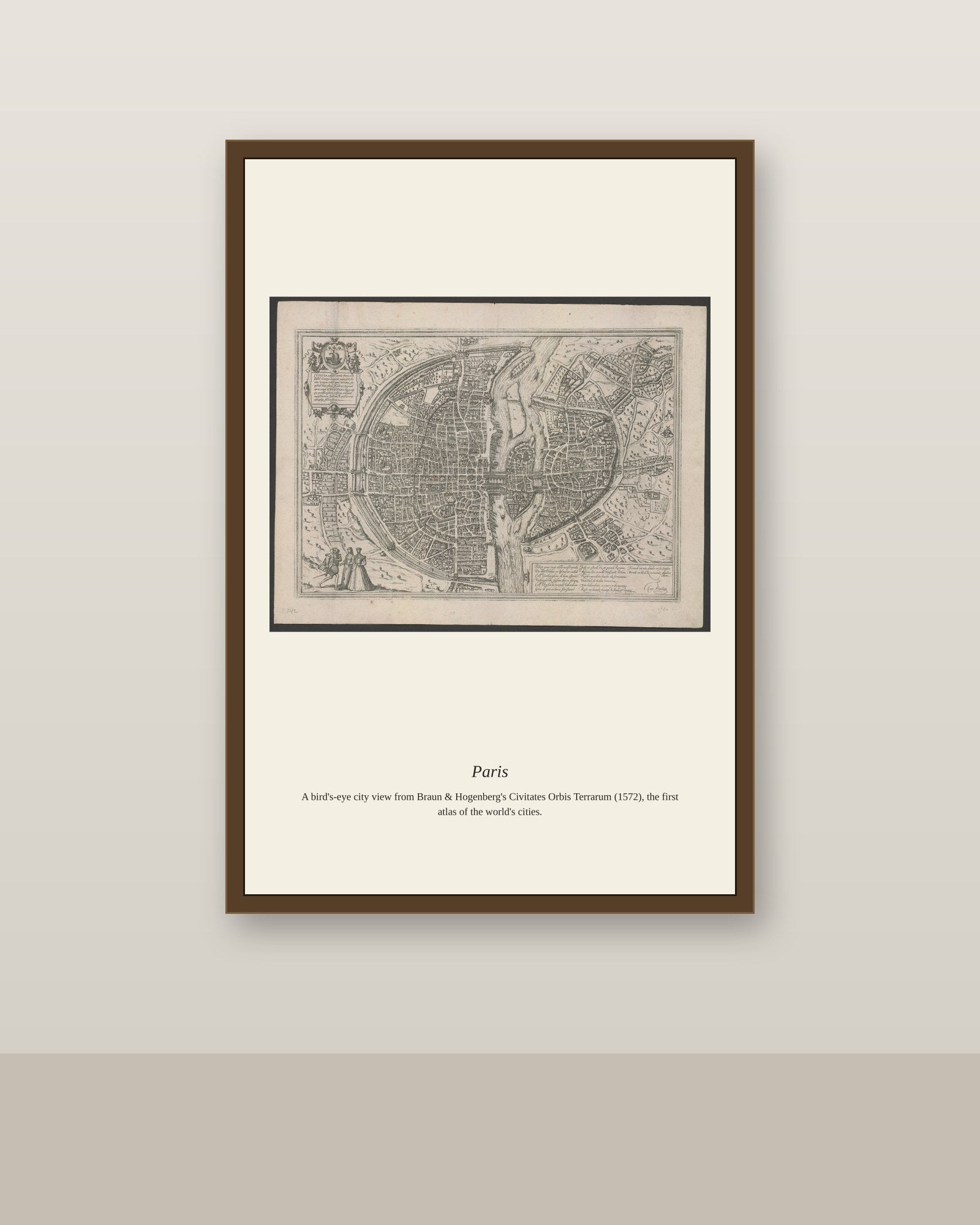 Paris (2) antique city map print shown framed on a wall in a styled room