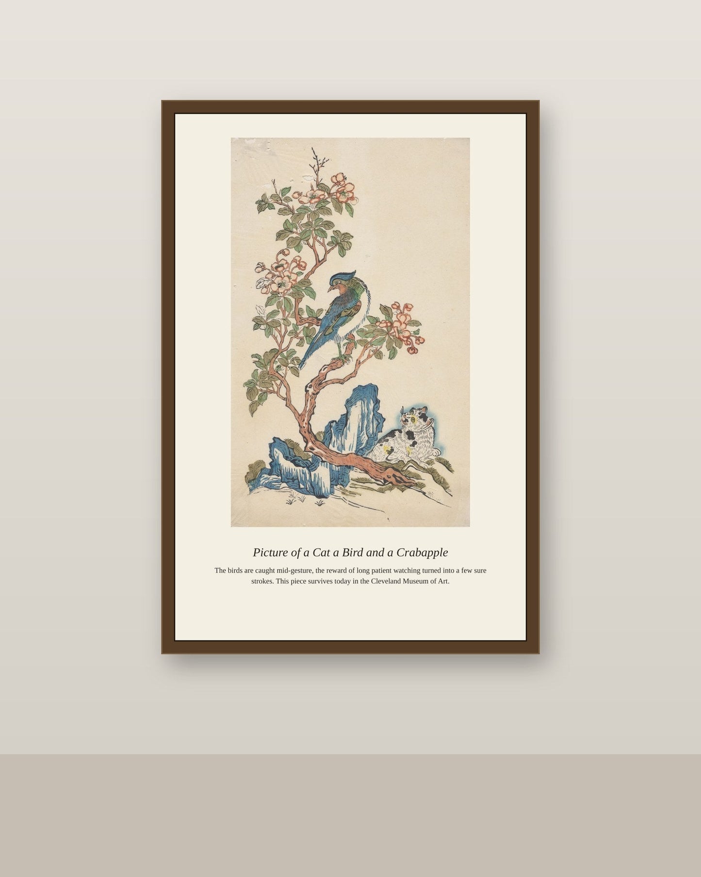 Picture of a Cat a Bird antique natural history print shown framed on a wall in a styled room