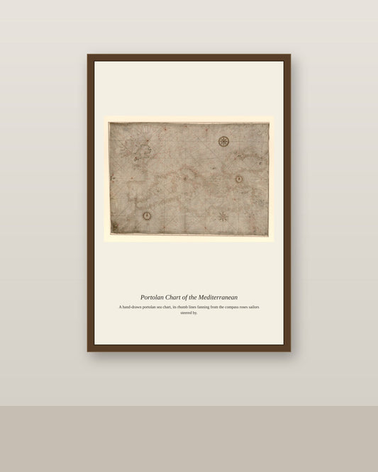 Portolan Chart of the Mediterranean antique nautical chart print shown framed on a wall in a styled room