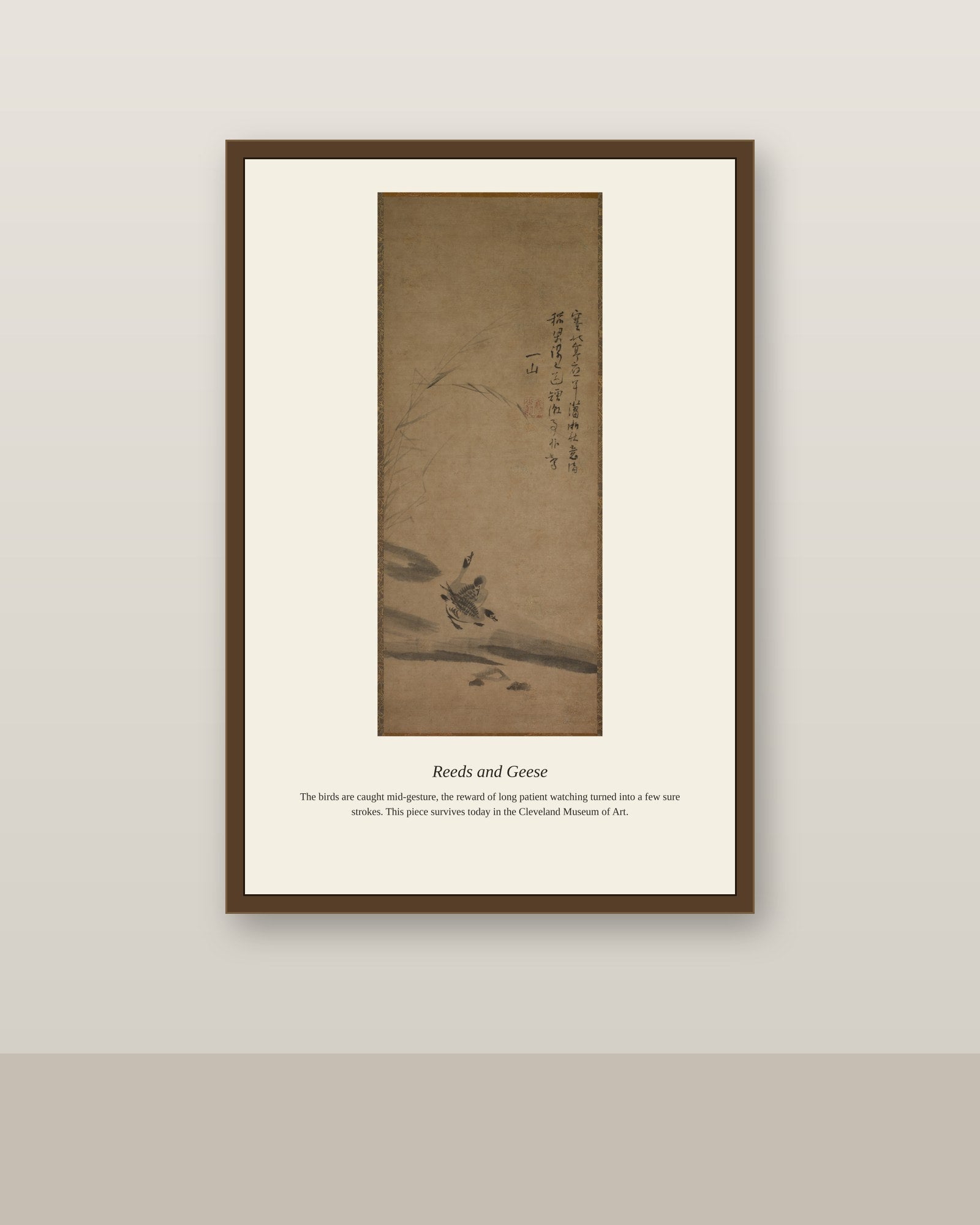 Reeds and Geese antique natural history print shown framed on a wall in a styled room