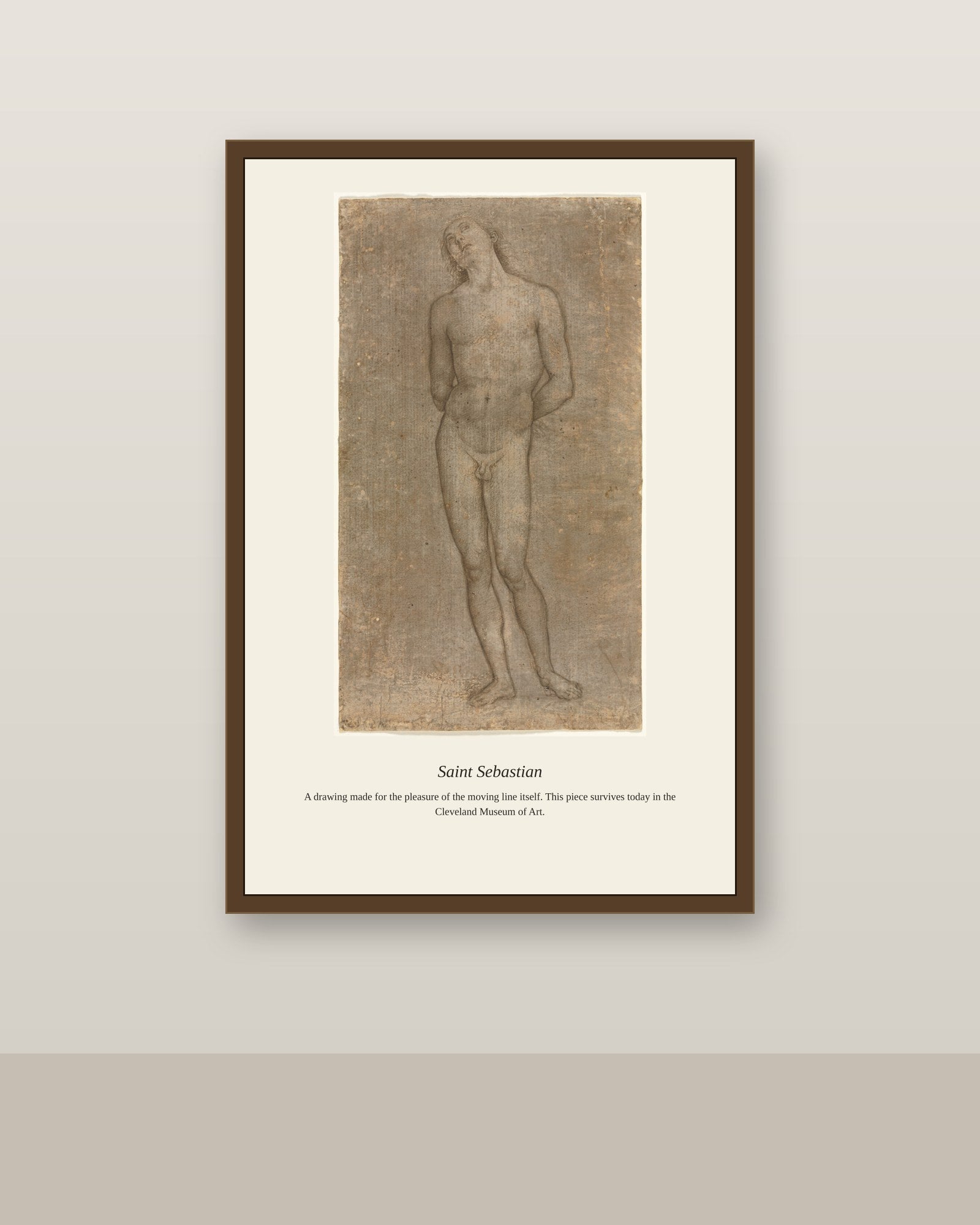Saint Sebastian antique religious art print shown framed on a wall in a styled room