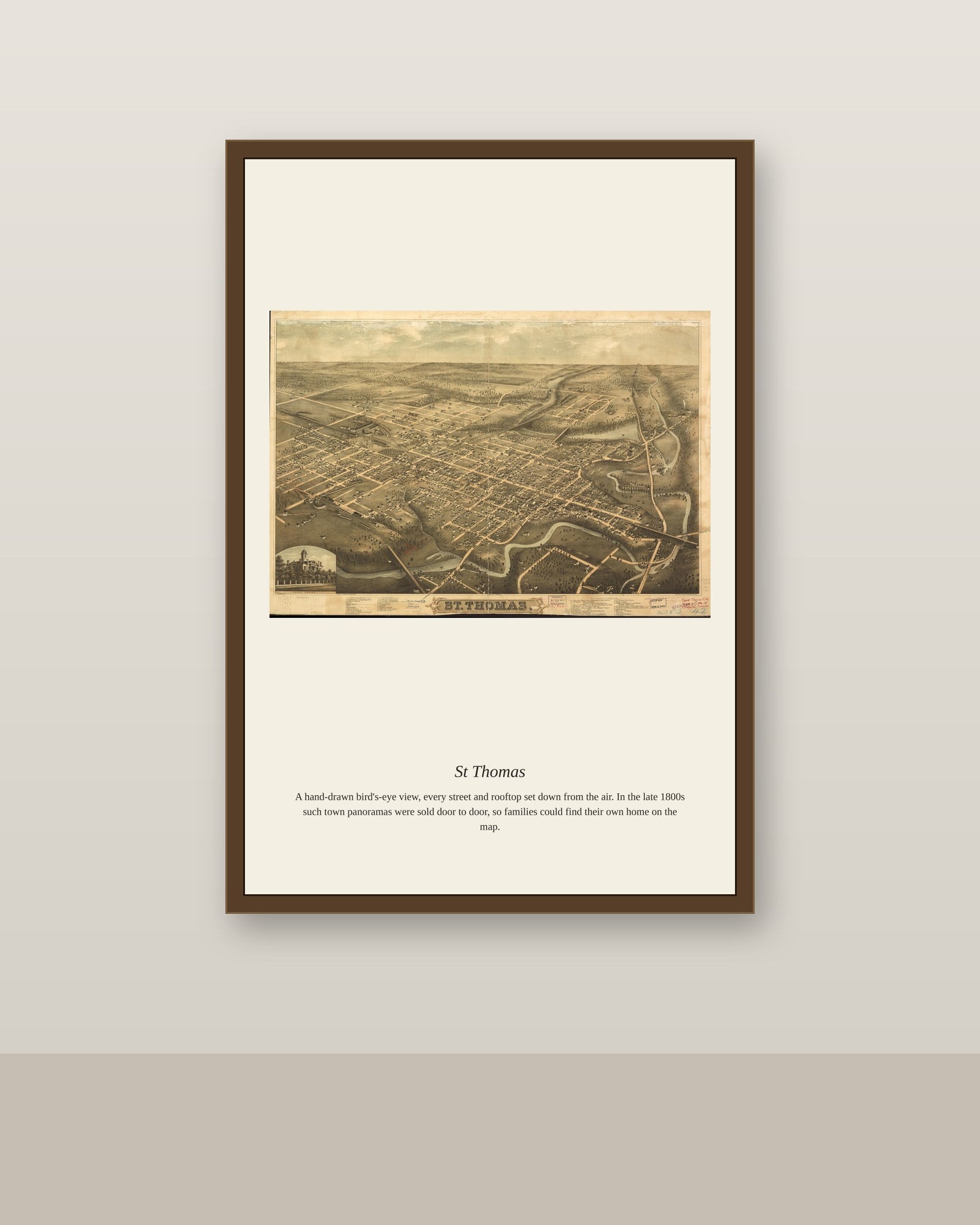 St Thomas antique map print shown framed on a wall in a styled room