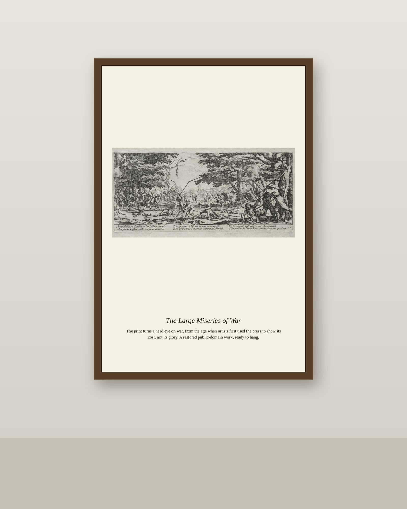 The Large Miseries of War antique historical print shown framed on a wall in a styled room
