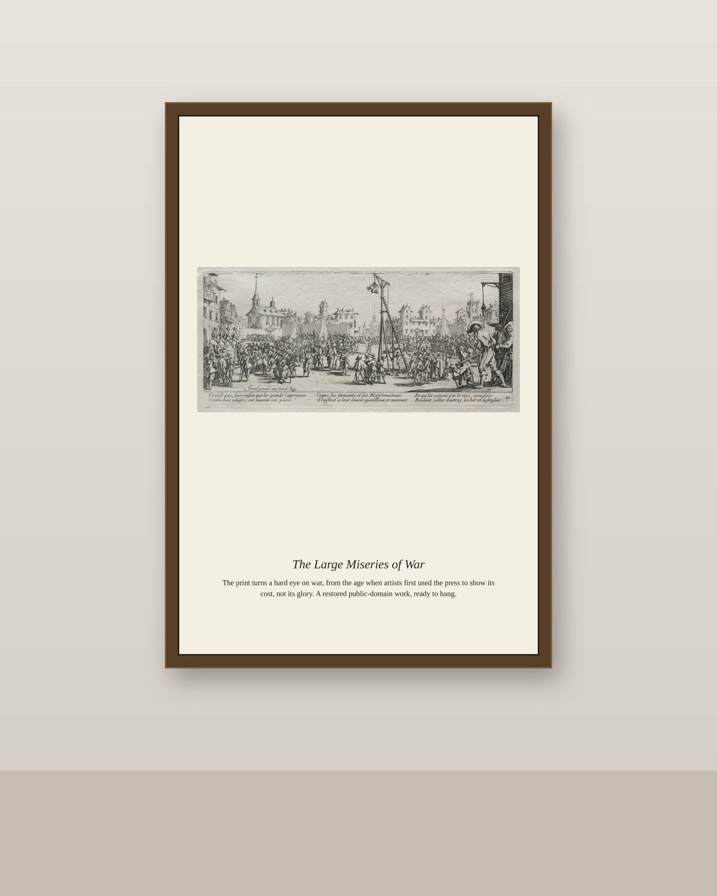 The Large Miseries of War (11) antique historical print shown framed on a wall in a styled room